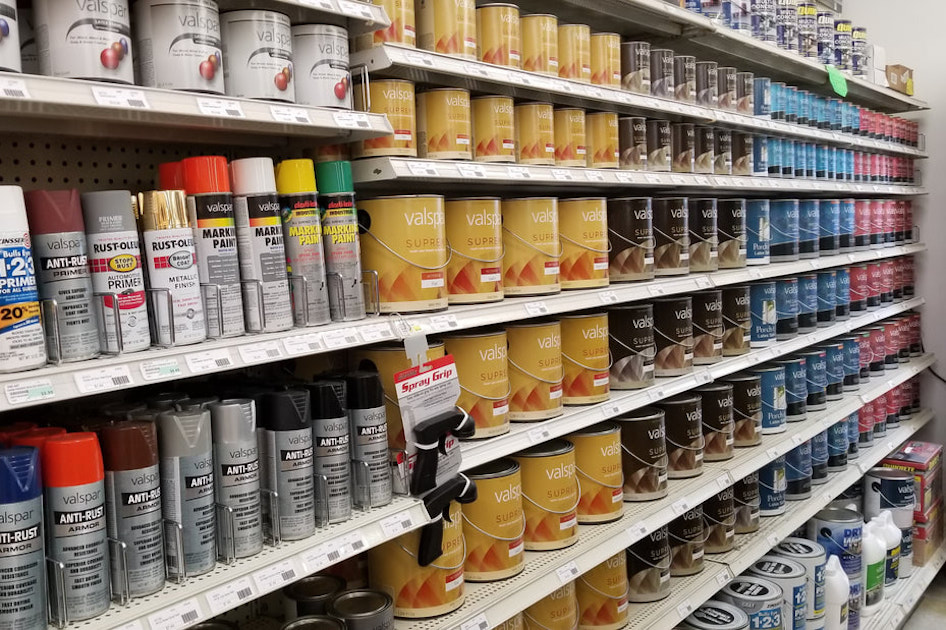 Paint Cans On Shelves